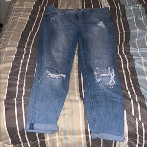 Ripped boyfriend jeans.